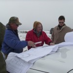 Ted and Walterio verifying construction