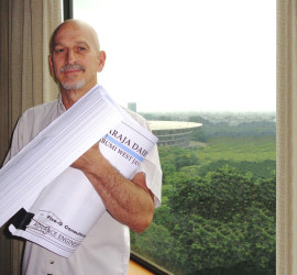 Donald Gribble with engineering plans